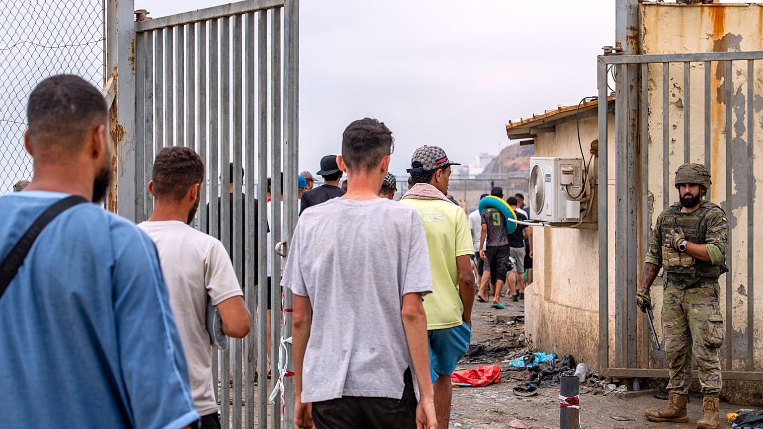 Migrants return to Morocco from the Spanish enclave of Ceuta, Friday, July 31, 2026.