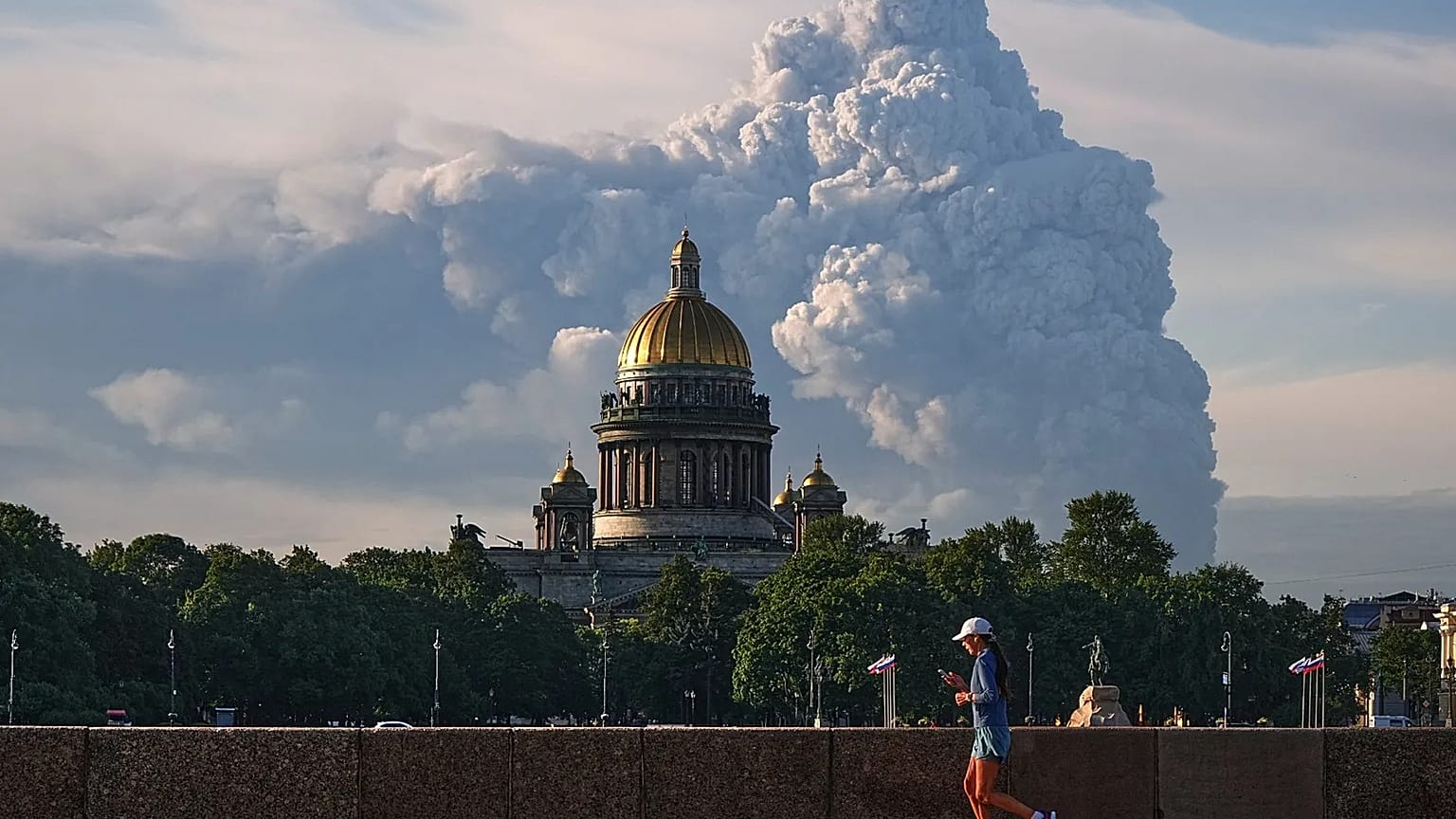 Smoke billows into the sky following Ukrainian drone strikes on warehouses of Russia's online retailer Wildberries, in St. Petersburg, Russia, Friday, July 24, 2026.