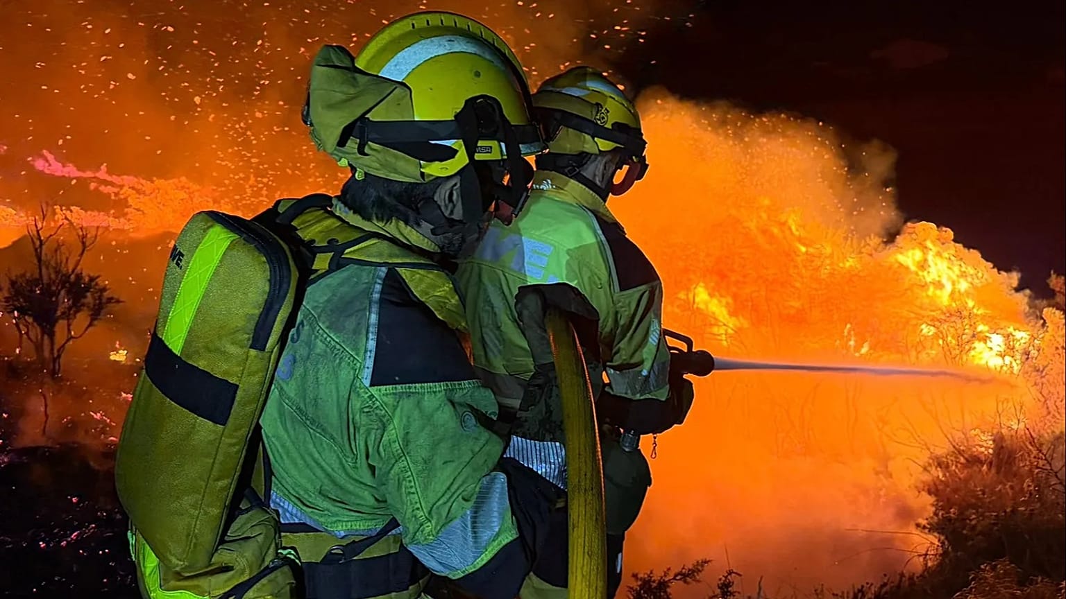 Firefighters battling the blaze through the night, 8 August 2026