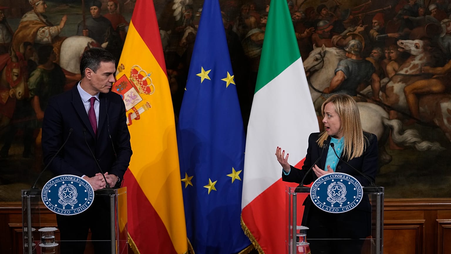 Spain's Prime Minister Pedro Sanchez, left, and Italian Premier Giorgia Meloni speak to media at Chigi government office in Rome Wednesday, April 5, 2023.