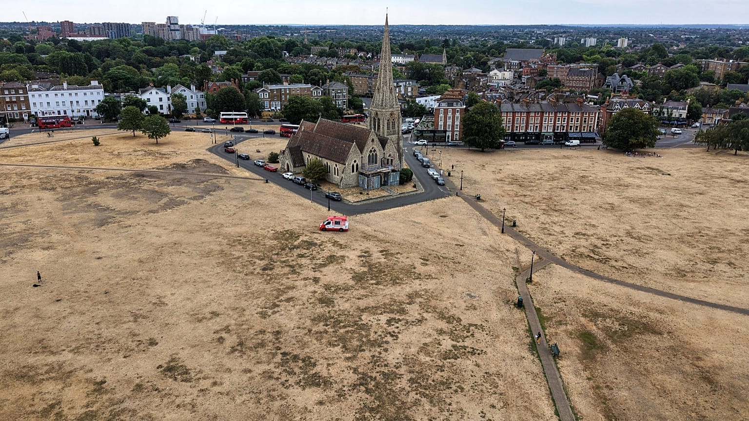 Dried vegetation is seen surrounding the All Saints church in Blackheath, 4 August, 2026